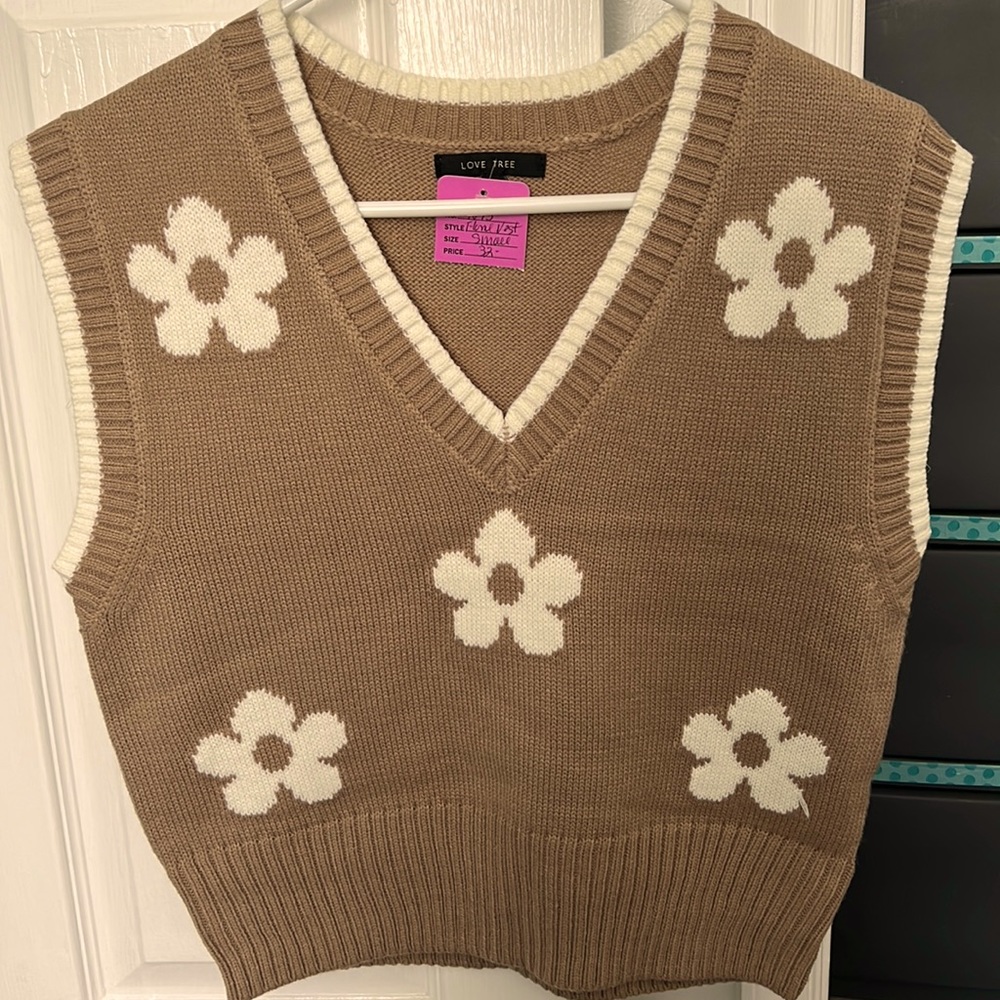 Floral sweater vest.